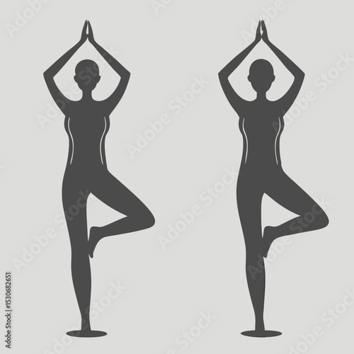 Two women practicing tree pose yoga