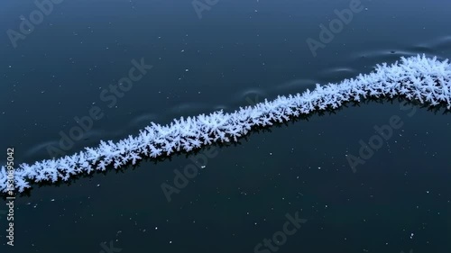 Wallpaper Mural Mesmerizing ice crystals on the surface of frozen water during cold winter season Torontodigital.ca
