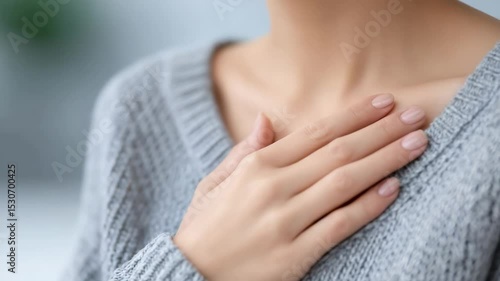 Wallpaper Mural Coping with grief concept. A person sitting quietly with their hand over their heart, symbolizing emotional healing. Torontodigital.ca