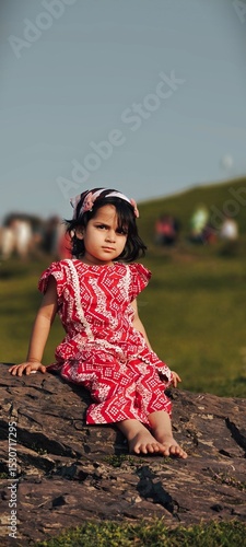 little girl in the woods