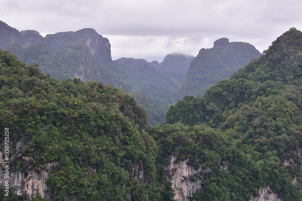 Naklejka premium cloudy calcareous mountains, Green mountains and clouds, mist clouds after rain