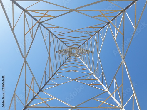 Electric transmission towers are part of the electric power system used to distribute electricity from power plants to substations and then to consumers.