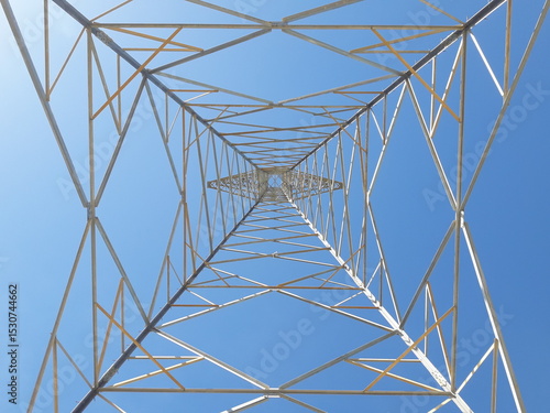 Electric transmission towers are part of the electric power system used to distribute electricity from power plants to substations and then to consumers.