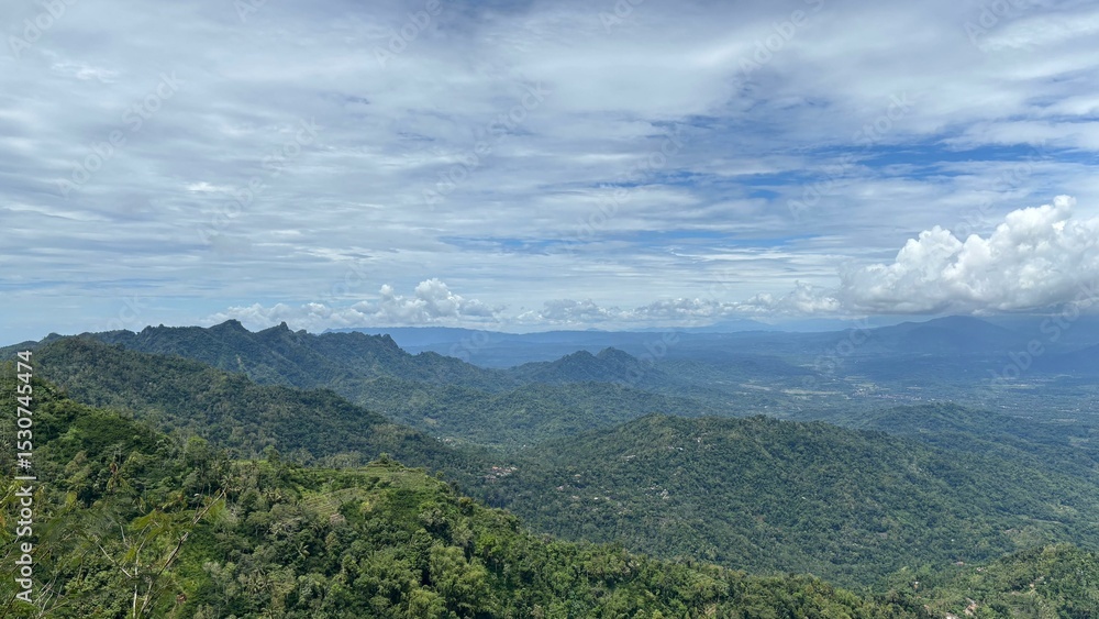 Naklejka premium clouds over the mountains
