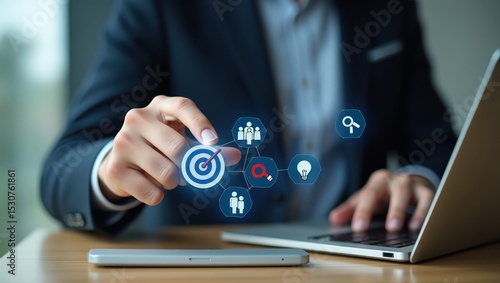 Wallpaper Mural A person interacts with a target and connected icons on a virtual interface. Torontodigital.ca