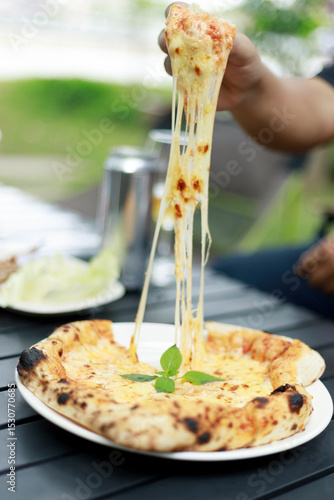 pizza with ham and cheese