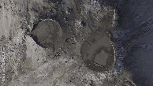 Buzău's Boiling Mud Volcanoes.
This aerial video captures a surreal landscape in Buzău County, Romania, showcasing the unique and otherworldly Muddy Volcanoes. 