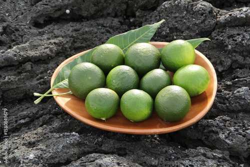 green tangerine on the ground