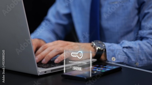 Obraz na plátně Man typing his password and verification to a two steps authentication on laptop