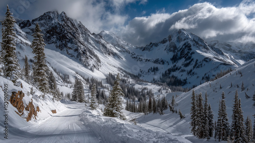 Wallpaper Mural An empty ski trail winds through fresh, untouched snow beneath dramatic mountain peaks. The crisp white landscape and vast sky evoke solitude, adventure, and winter’s pristine beauty. Torontodigital.ca