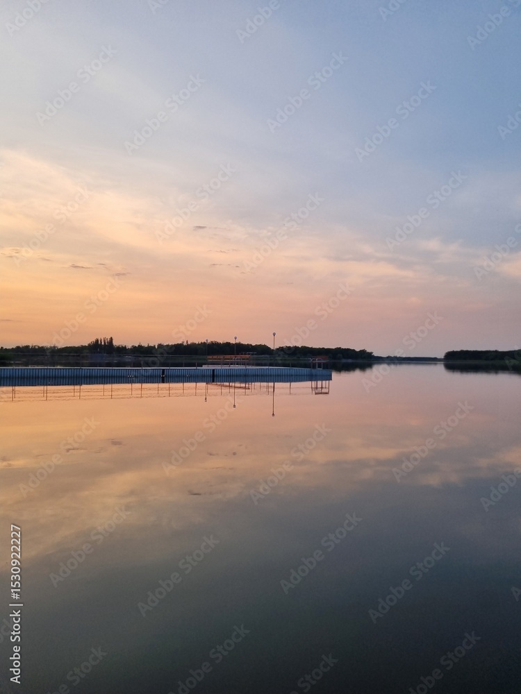 Obraz premium sunset over the river