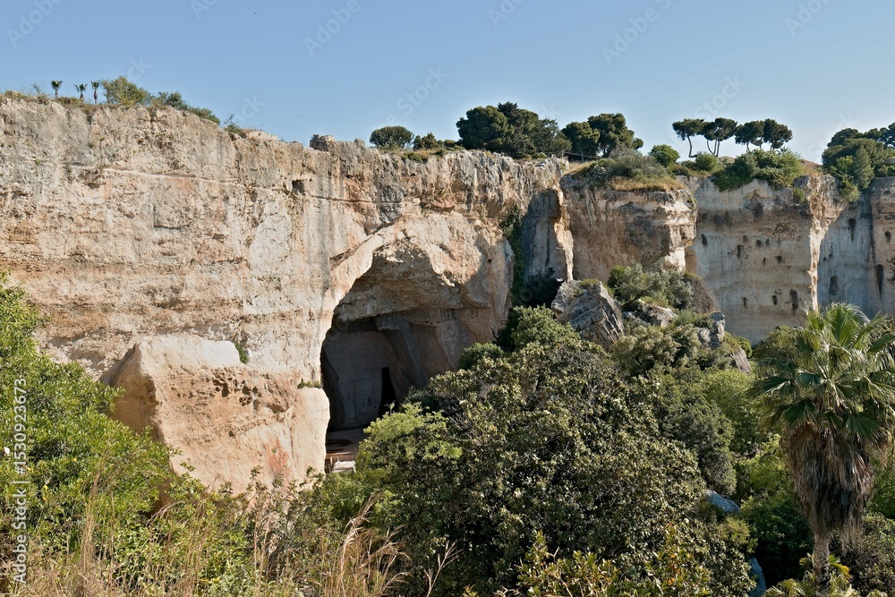Fototapeta premium Grotta dei Cordari, Neapolis Archaeological Park in Syracuse, Sicily. UNESCO World heritage. Italy. Europe.