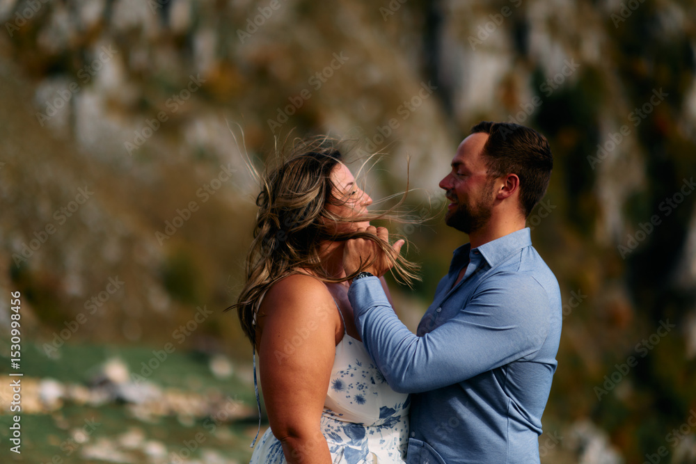 Fototapeta premium Loving couple sharing intimate gaze outdoors