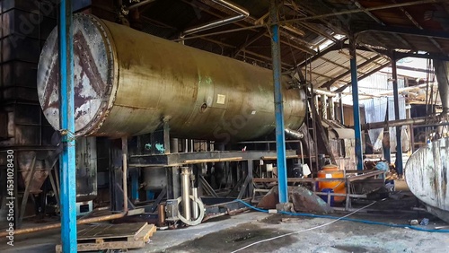 Decommissioned wood ply manufacturing plant, Industrial machineries and tools of Old Factory Facility, Rusty large industrial facilities