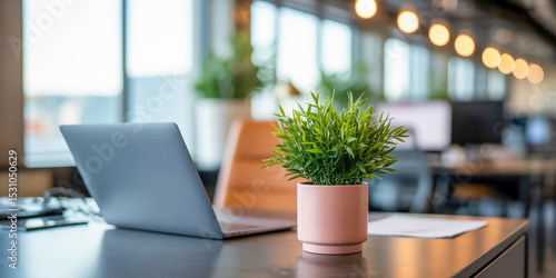 Wallpaper Mural Minimalist Modern Office Desk with Silver Laptop and Pink Potted Plant in Soft Natural Lighting Torontodigital.ca