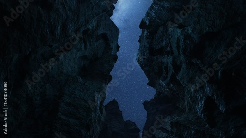 walking through rock walls of a cave with a starry sky above