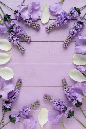 Pastel purple wooden flatlay background with lavender flower blossoms