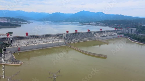Aerial view of Three Gorges Dam hydropower station on the Yangtze River in Yichang, China, showing the massive structure and surrounding landscape