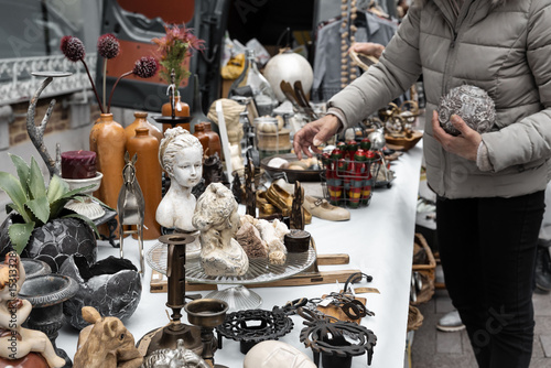 rummaging around at a flea market looking for a special gadget