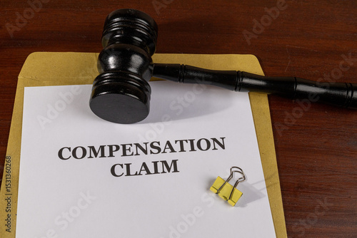 Фотография Compensation Claim Legal Document with Gavel – Workplace Injury and Legal Restit
