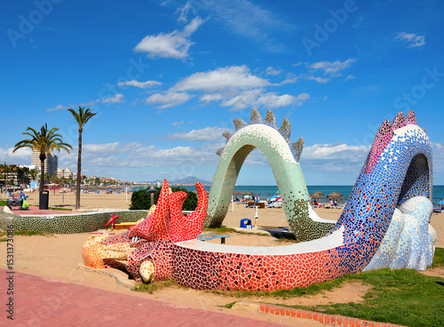 Wallpaper Mural colorful dragon sculpture on the beach the sculpture is made of mosaic tiles and is located on Playa Norte, one of the most popular beaches in the city of peniscola spain Torontodigital.ca