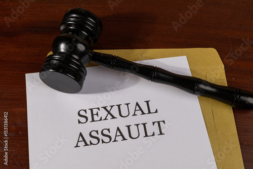 Фотография Sexual Assault Title on Legal Documents Set on Desk – Legal Concept