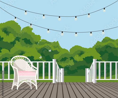 Wicker chair on the veranda overlooking the garden.