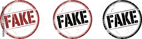 A worn stamp with the word fake diagonally across the center in black ink