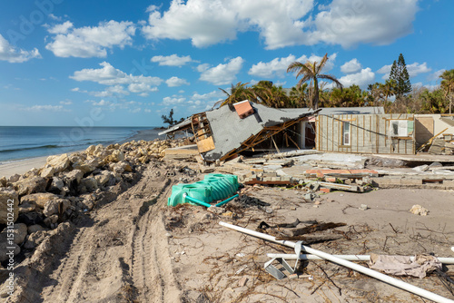 Photos Storm surge severe damage to residential houses on ocean shore after hurricane landfall