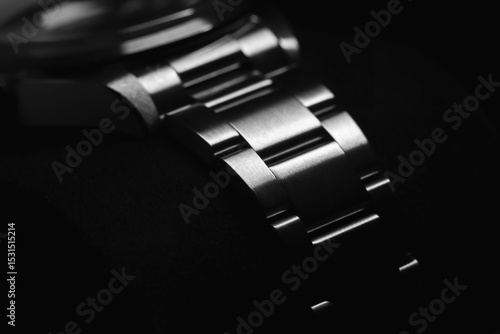 Detailed and elegant perspective of a stainless steel watch bracelet