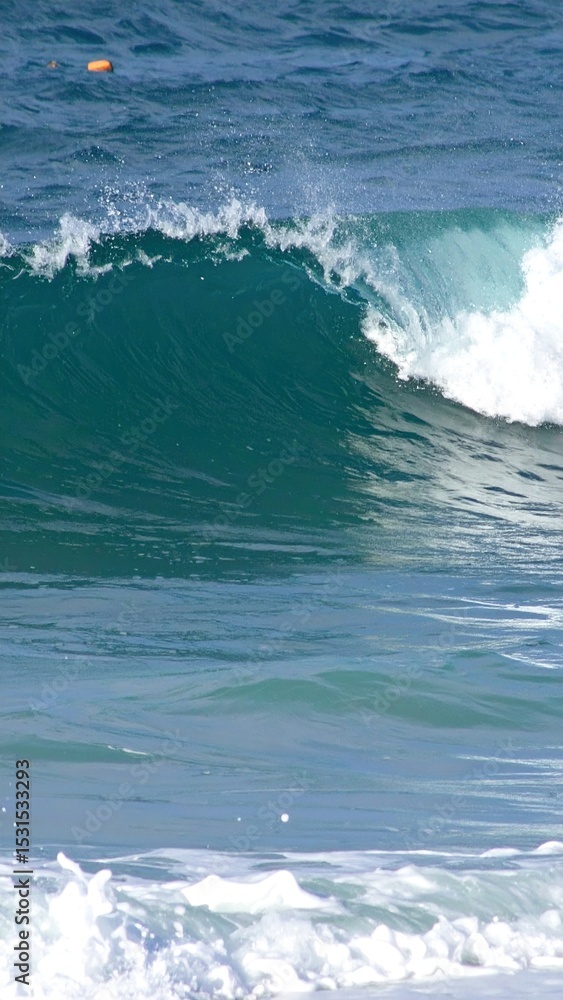 Fototapeta premium Ocean Wave Crashing with Blue Water.