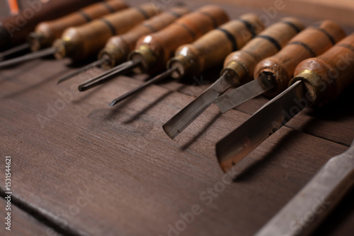 Bild auf Leinwand woodworking tools. chisels on a wooden background.