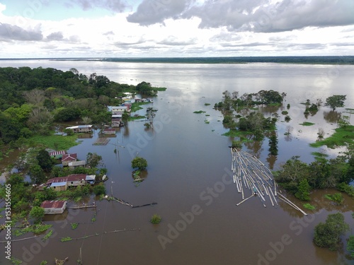 houses in an area flooded by the great flood of 2025 in the Amazon
