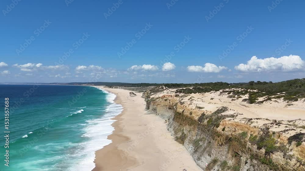 High drone view above golden coastal cliffs and turquoise ocean waters near Lisbon. Aerial scene showcasing vivid textures between rock, sand, and clear Atlantic waves in soft sunlight. High drone view above golden coastal cliffs and turquoise ocean waters near Lisbon. Aerial scene showcasing vivid textures between rock, sand, and clear Atlantic waves in soft sunlight.