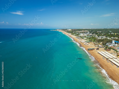 Aerial view of luxury resorts and sandy beach with turquoise sea water in Side, Antalya region, Turkey
