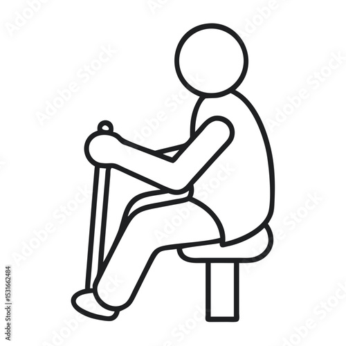 Senior Citizen Seated and Holding a Cane in a Resting Position Indoors