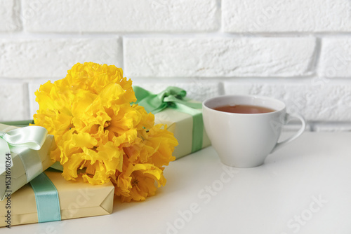 Narcissus flowers with gift...