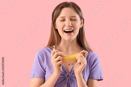 Happy woman with banana on ...
