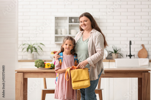 Mother with her daughter an...