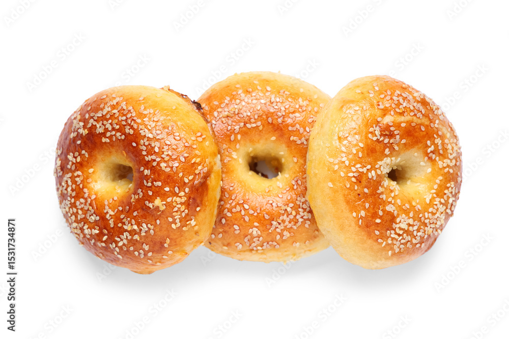 Tasty bagels with sesame seeds on white background Tasty bagels with sesame seeds on white background