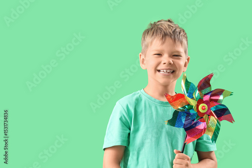 Cute little boy with toy wi...