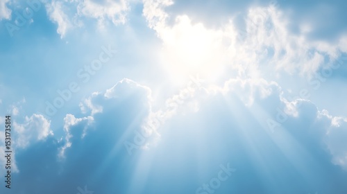 Fototapeta Naklejka Na Ścianę i Meble -  Sunlight breaking through beautiful fluffy clouds