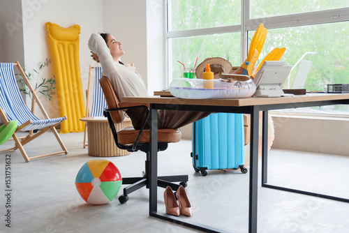 Happy businesswoman relaxin...