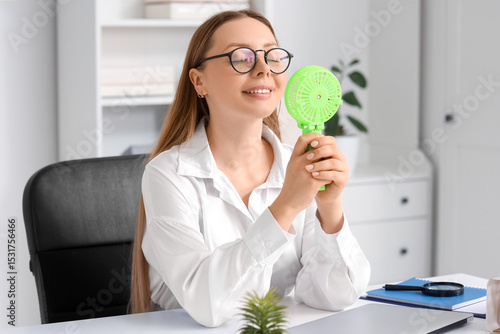 Young businesswoman with mi...