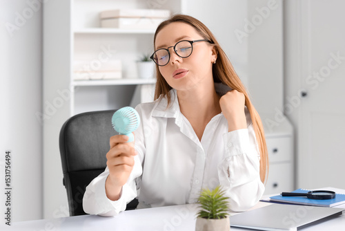 Young businesswoman with mi...