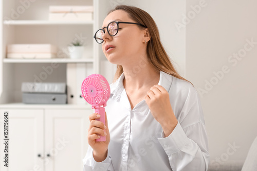 Young businesswoman with mi...