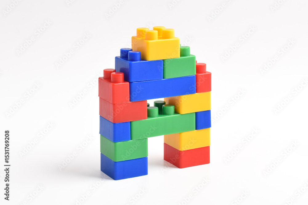 Fototapeta premium Plastic building blocks isolated on white background