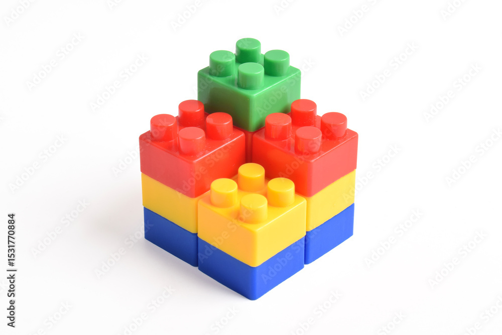 Obraz premium Plastic building blocks isolated on white background