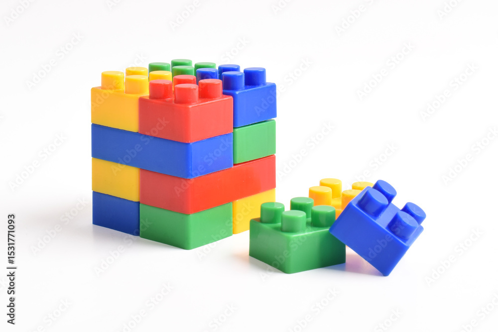Obraz premium Plastic building blocks isolated on white background