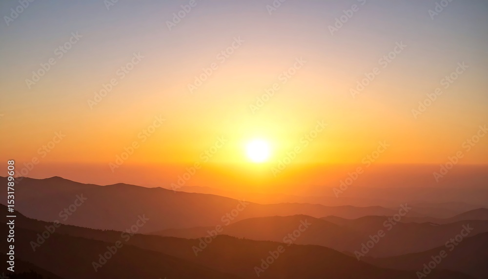 Obraz premium Sunrise over hazy mountains